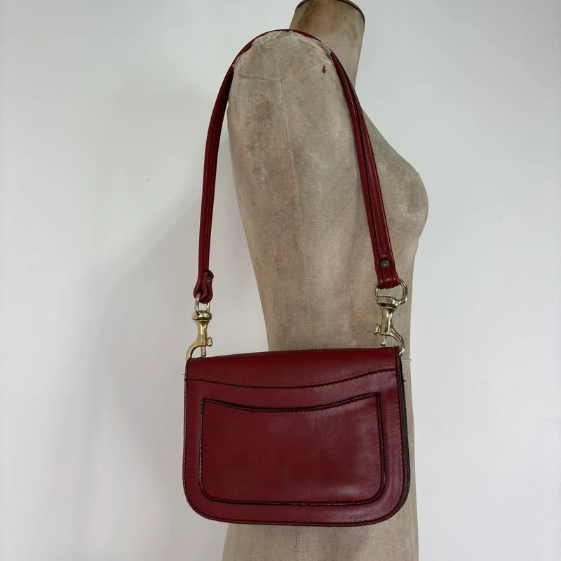 Red leather minimalistic shoulder handbag