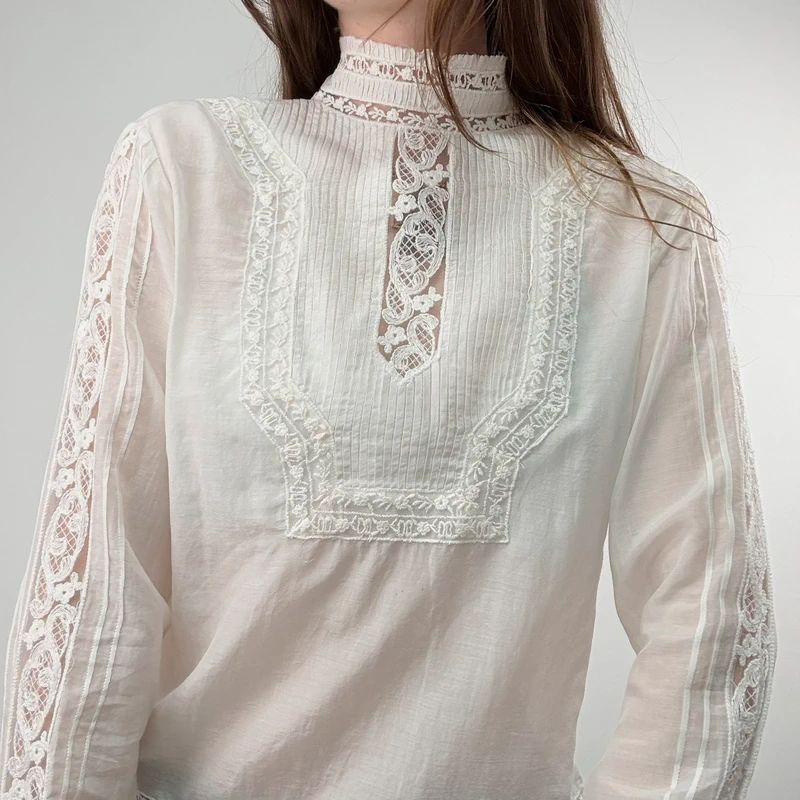 white pleated lace blouse