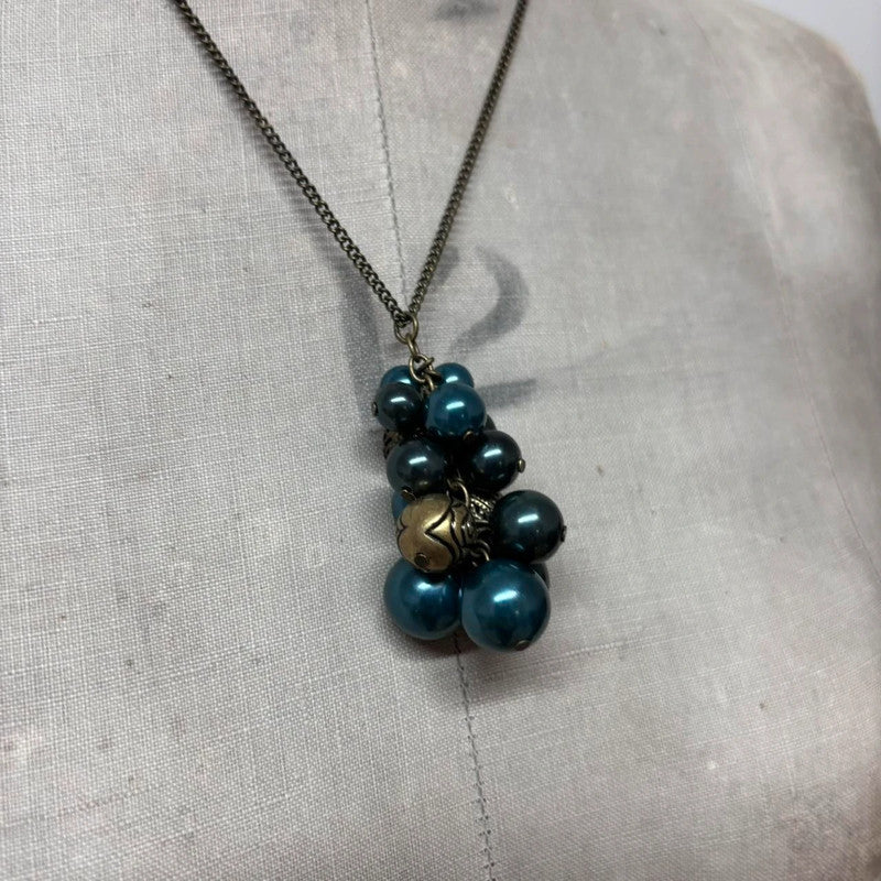 charm necklace hanging beads