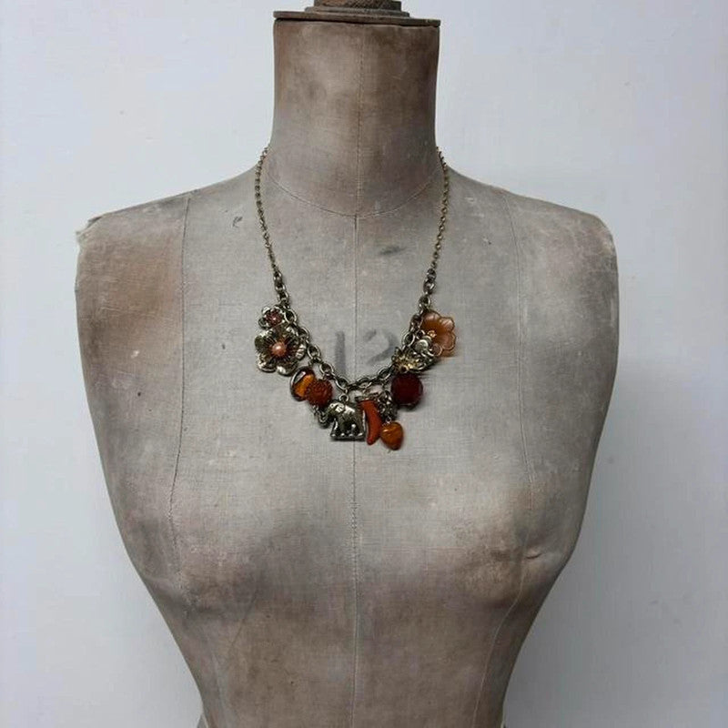 Gold flower elephant charm necklace
