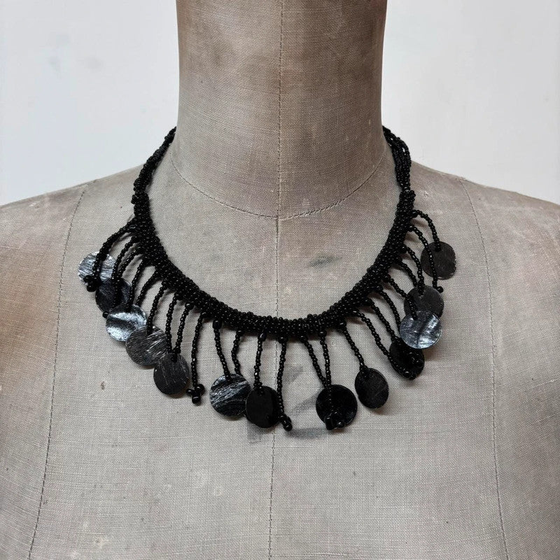 black beaded drape