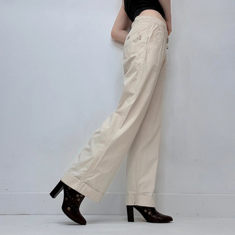 cop copine pleated front pinstripe trousers