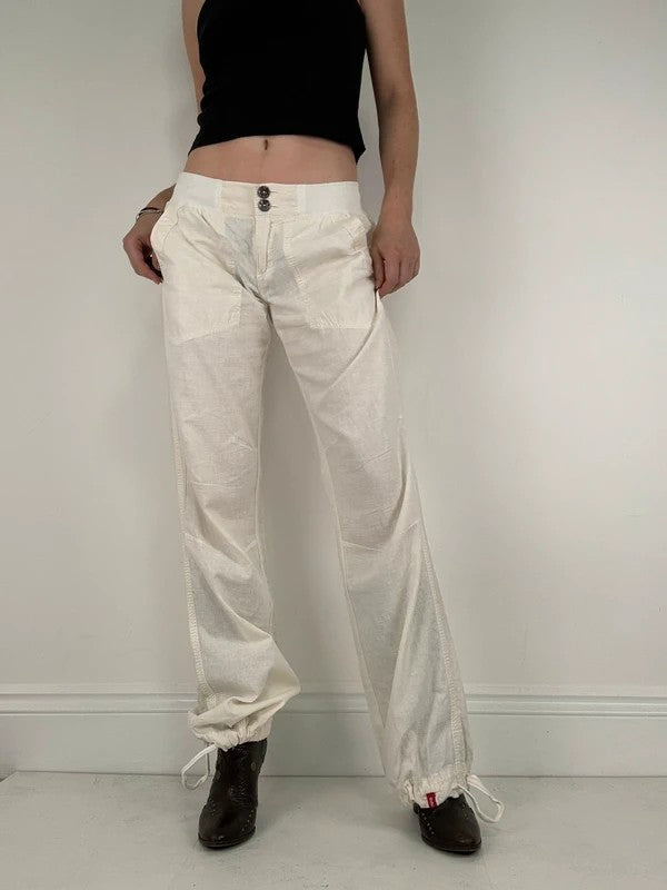 White low rise wide leg flared linen trousers