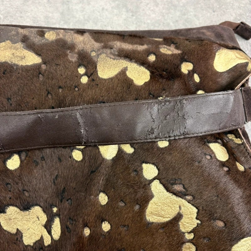 Brown cow hide leather satchel bag with gold embellishment