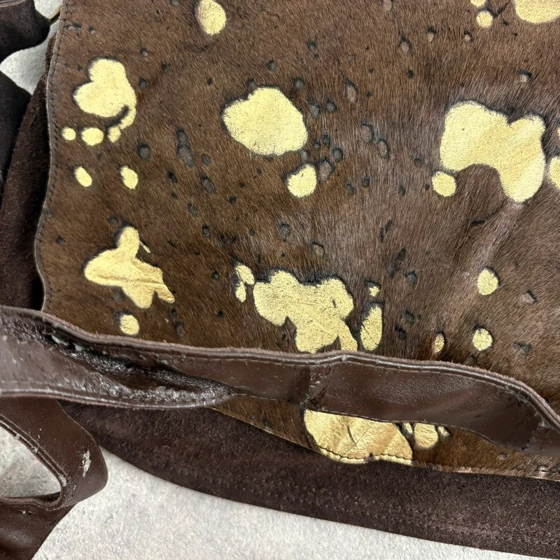 Brown cow hide leather satchel bag with gold embellishment