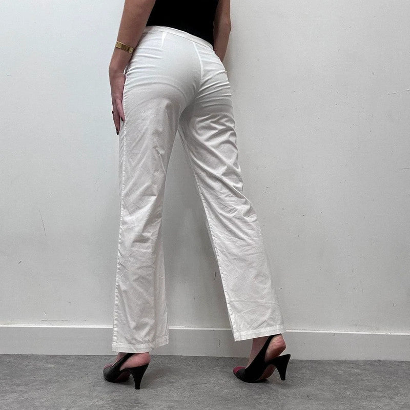 white minimalist flared trousers