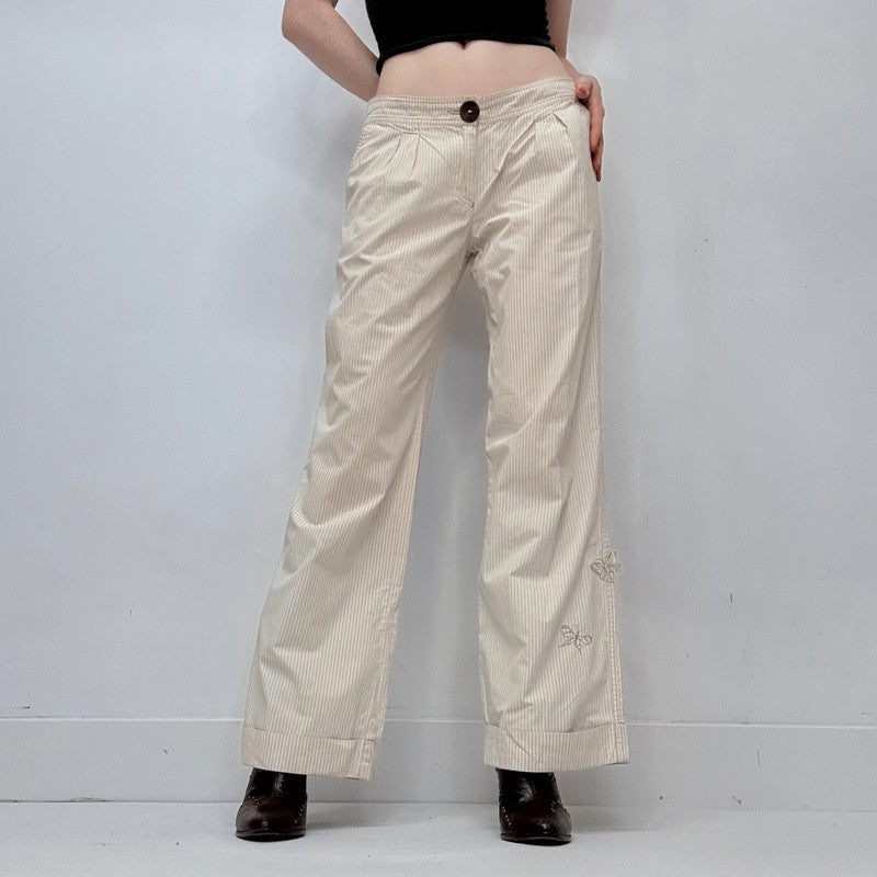 cop copine pleated front pinstripe trousers