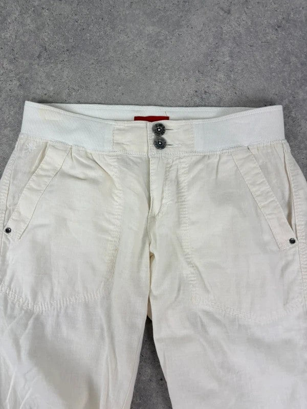 White low rise wide leg flared linen trousers