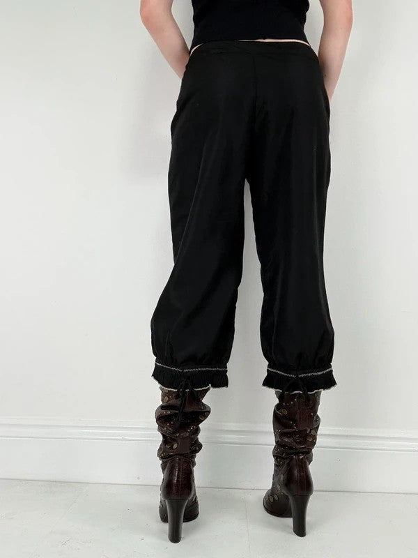 black capri pants pleated ruffle hem trousers