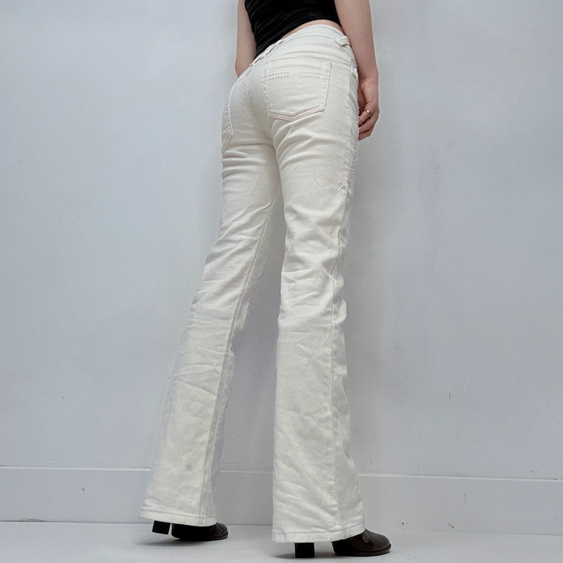 white low rise distressed stitched jeans