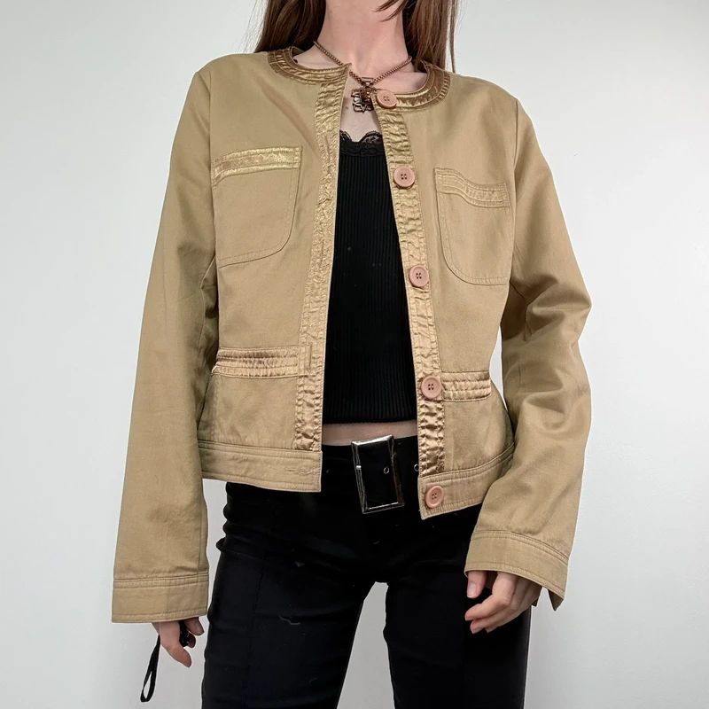 tan boxy cropped fit jacket with exposed button detail