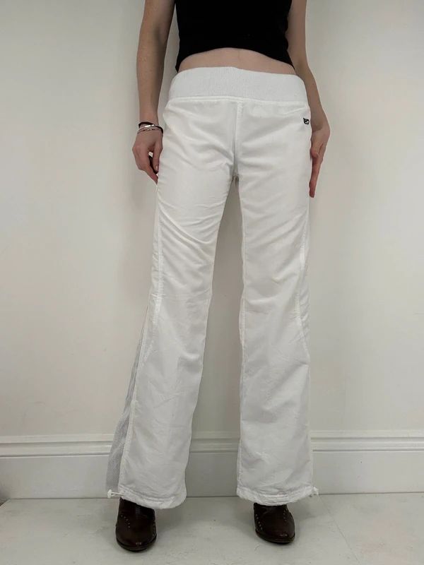 low rise white Reebok tracksuit bottoms