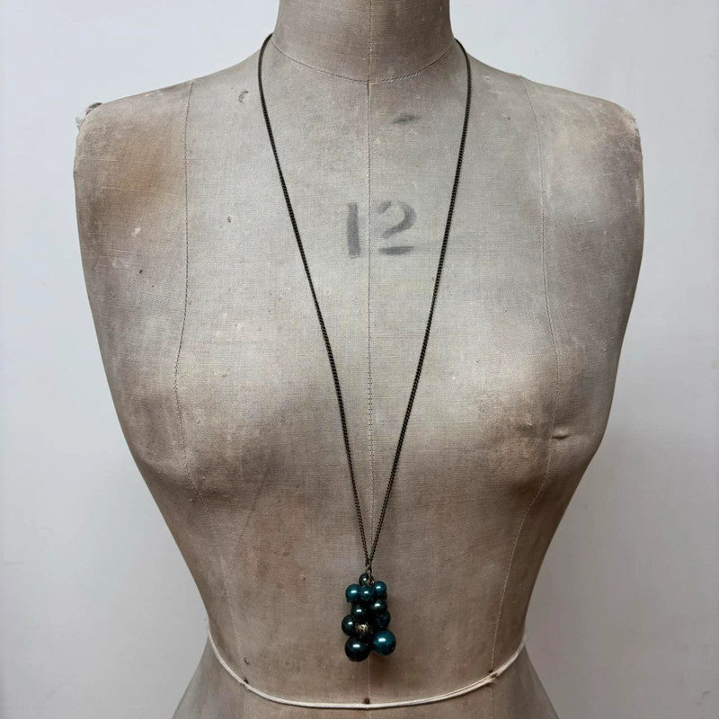 charm necklace hanging beads