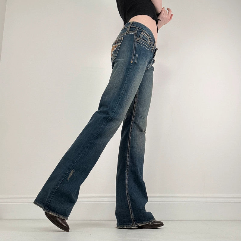 distressed denim low rise flared jeans