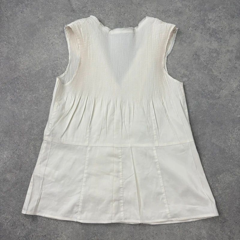 white cotton pleated blouse