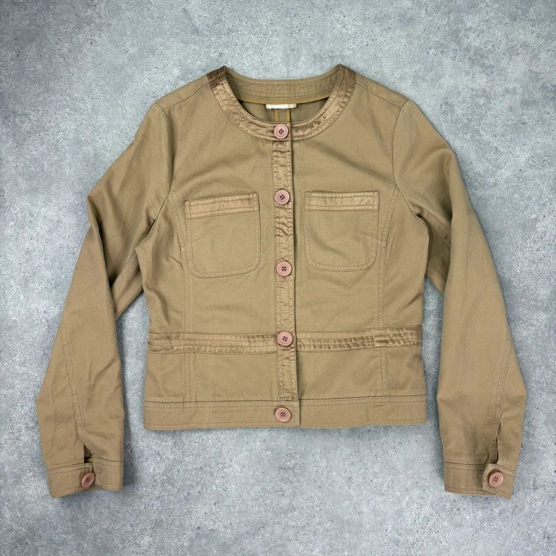 tan boxy cropped fit jacket with exposed button detail