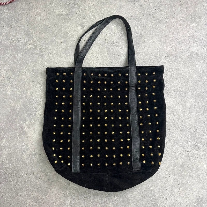 Black suede tote bag with gold studded spikes