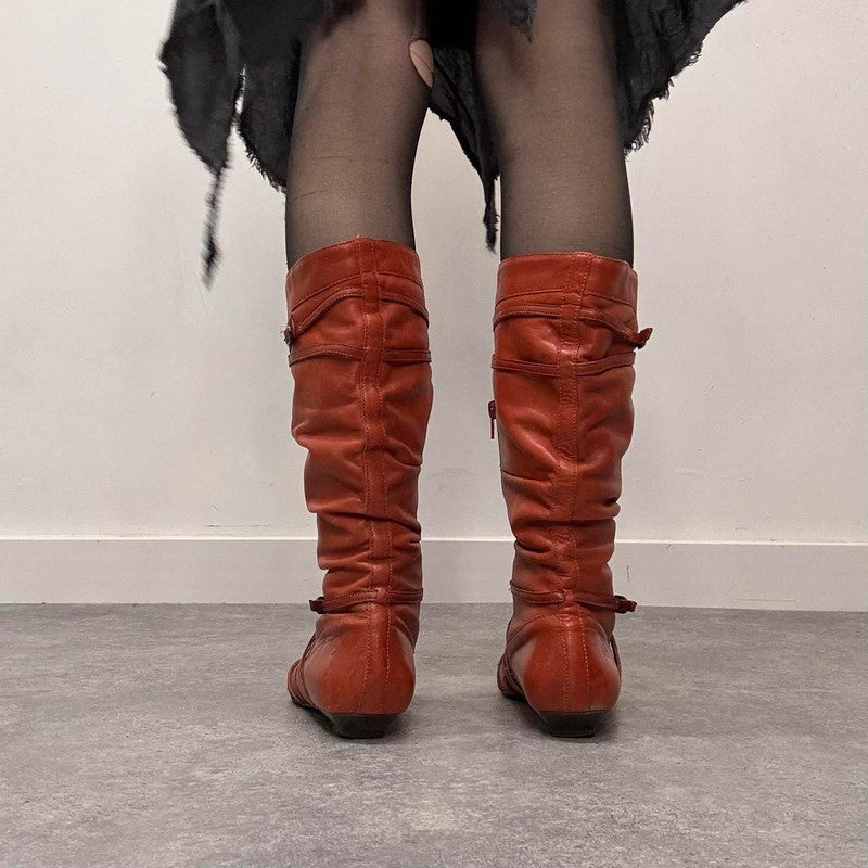 orange leather pointed pixie boots