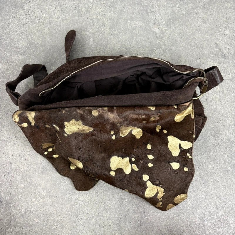 Brown cow hide leather satchel bag with gold embellishment