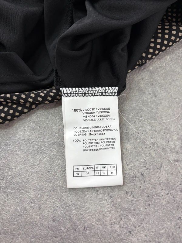 black polkadot flared midi dress