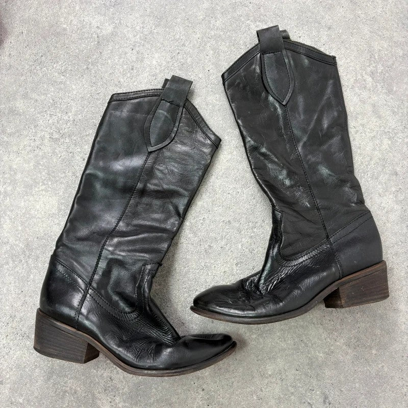 Black leather pointed toe boots