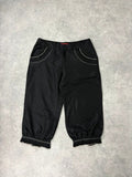 black capri pants pleated ruffle hem trousers
