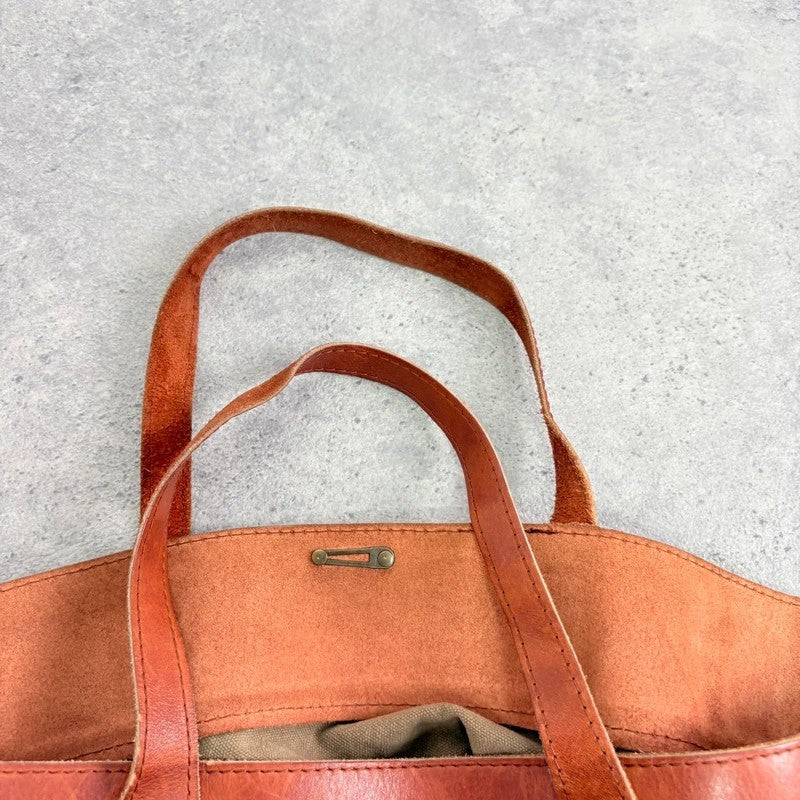 Slouchy oversized leather and canvas shoulder bag