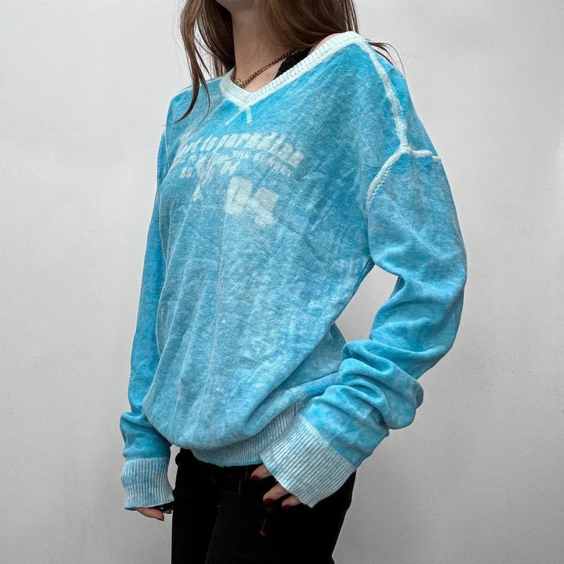 Slouchy oversized distressed knit jumper