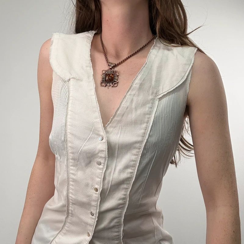 white cotton pleated blouse