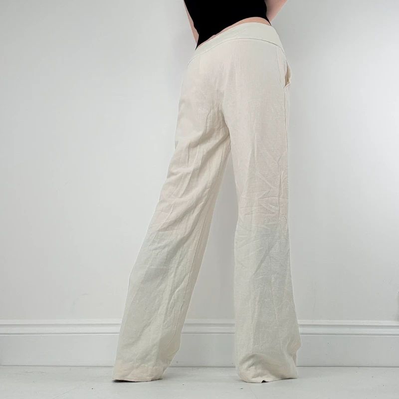 white flared wide leg thick waistband trousers