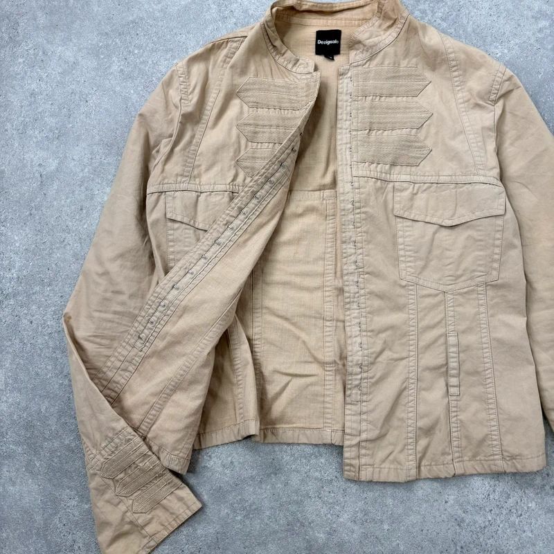 tan fitted panelled military jacket