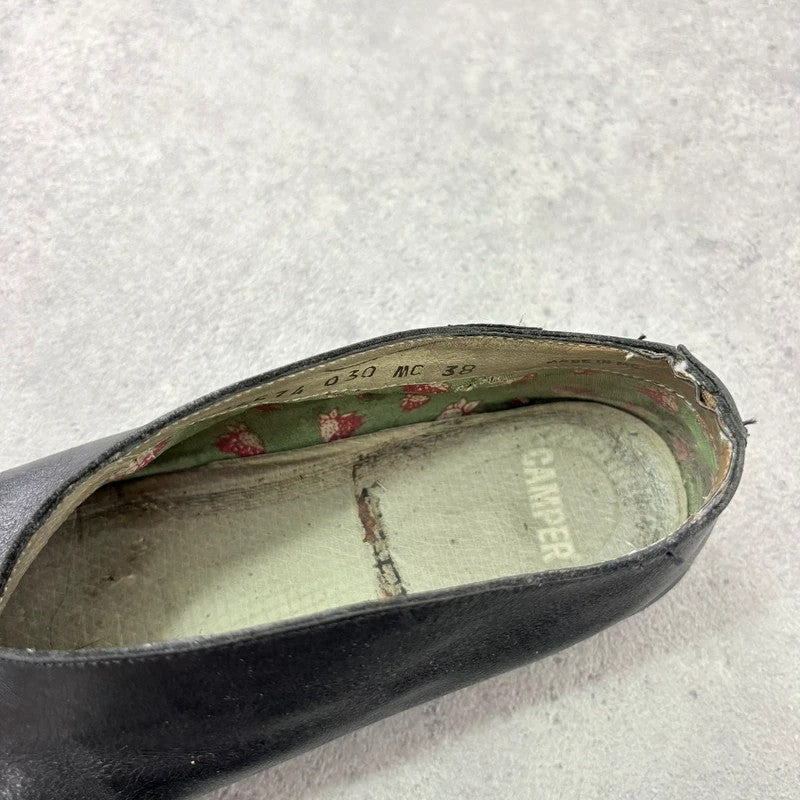 Black leather camper ballet flats