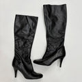 black pointed toe heel boots