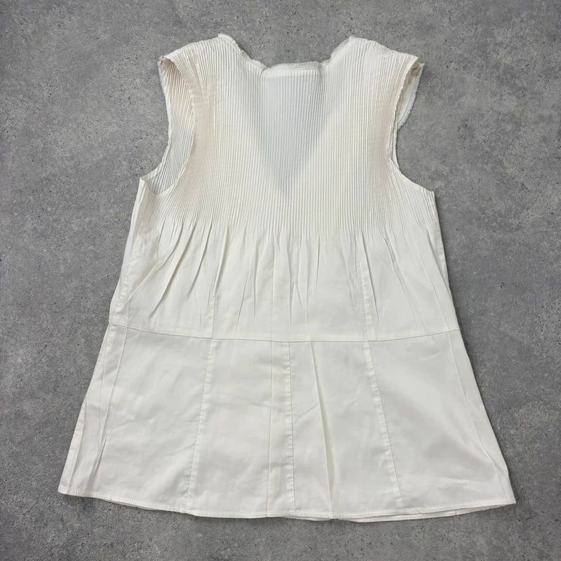 white cotton pleated blouse