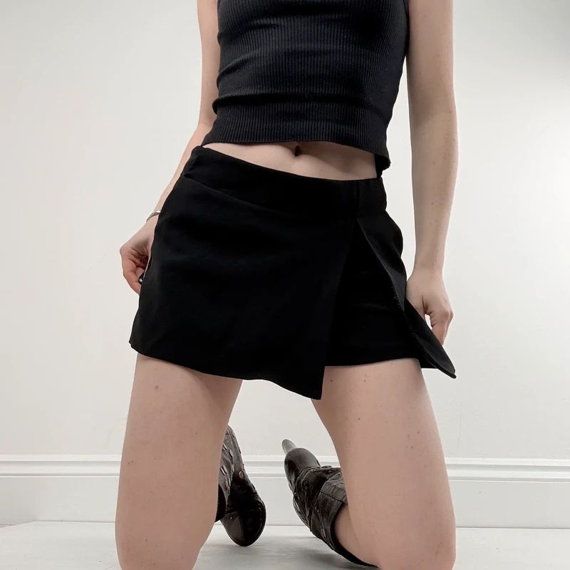black pleated front mini skirt