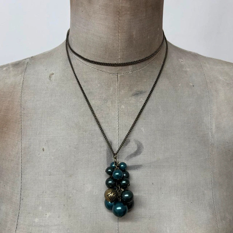 charm necklace hanging beads