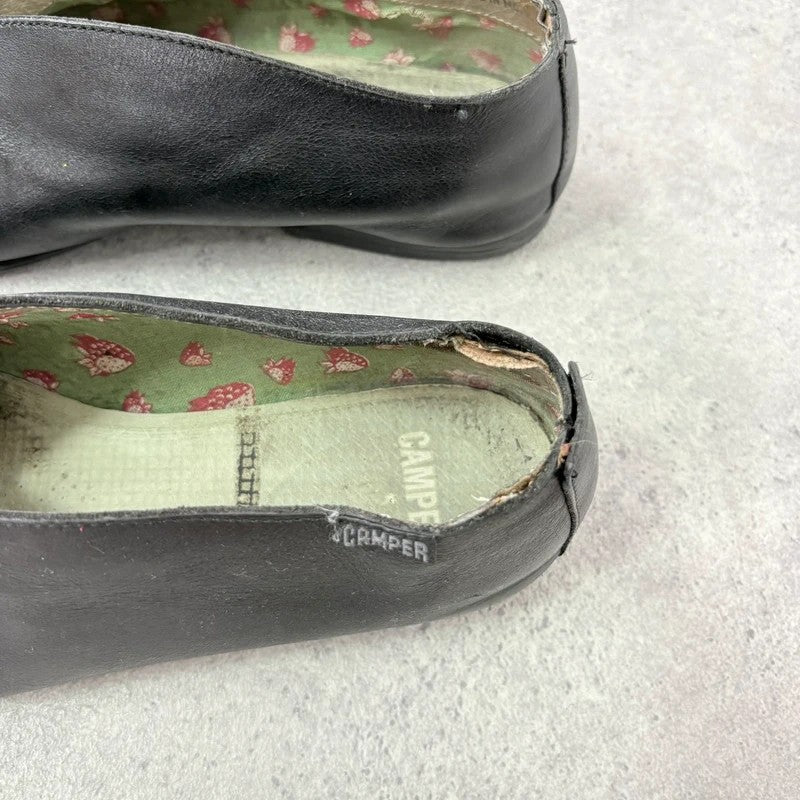 Black leather camper ballet flats