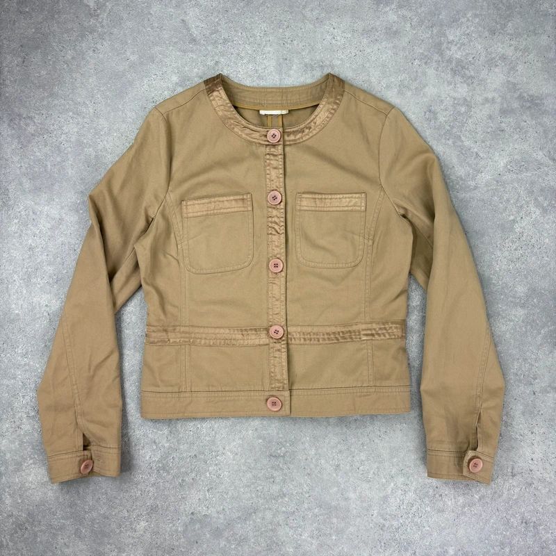 tan boxy cropped fit jacket with exposed button detail