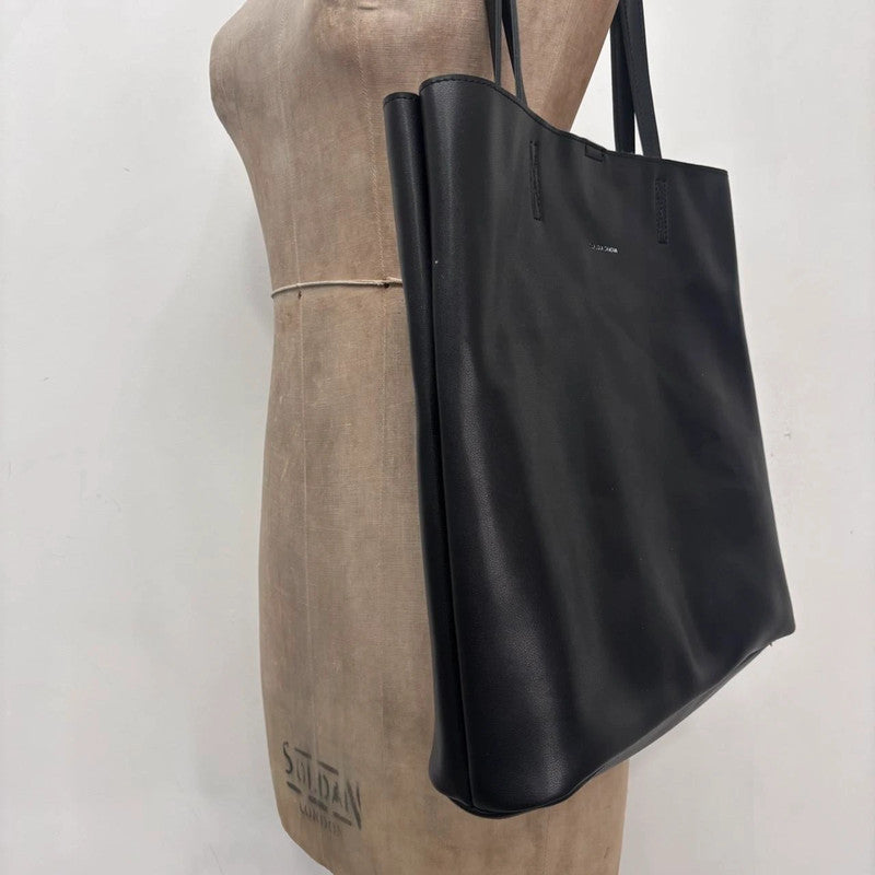 black faux leather tote bag