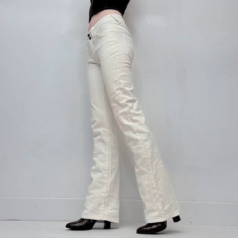 white low rise distressed stitched jeans