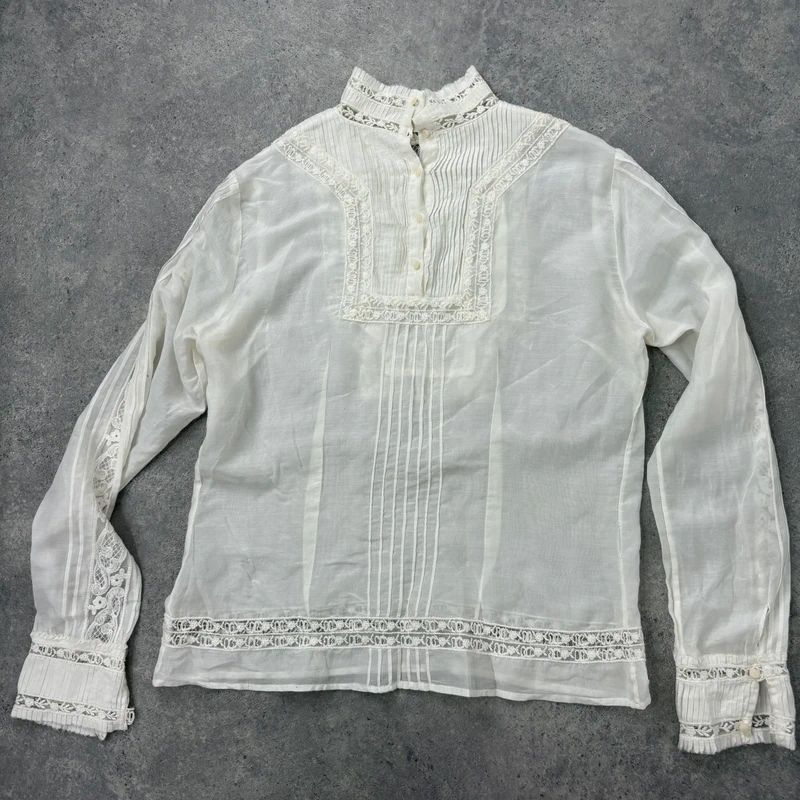 white pleated lace blouse