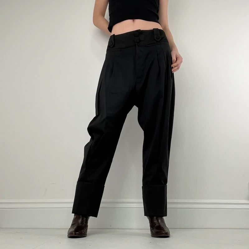 pleated black tailored trousers