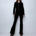black flared fitted black jumpsuit