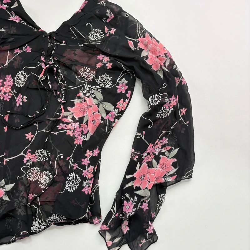 Sheer Black Asymmetric Flutter Blouse
