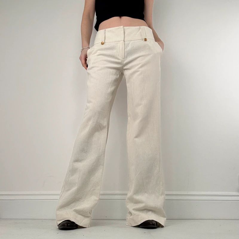 white flared wide leg thick waistband trousers