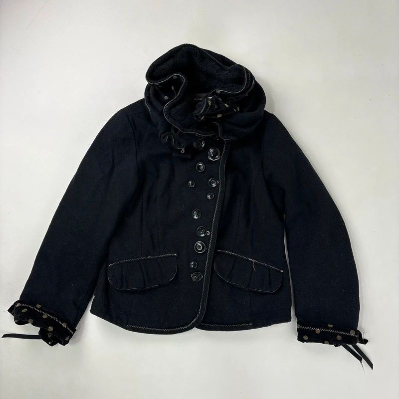 black structured asymmetric polkadot coat