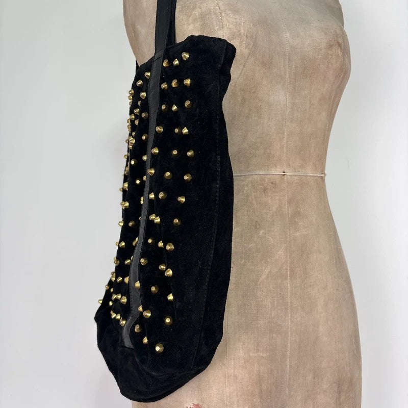 Black suede tote bag with gold studded spikes