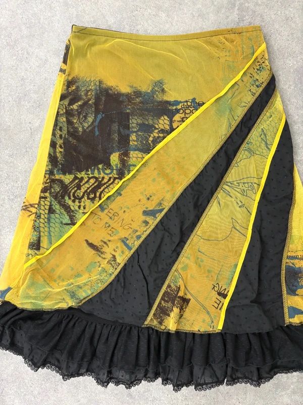Patchwork graphic mesh layered long skirt
