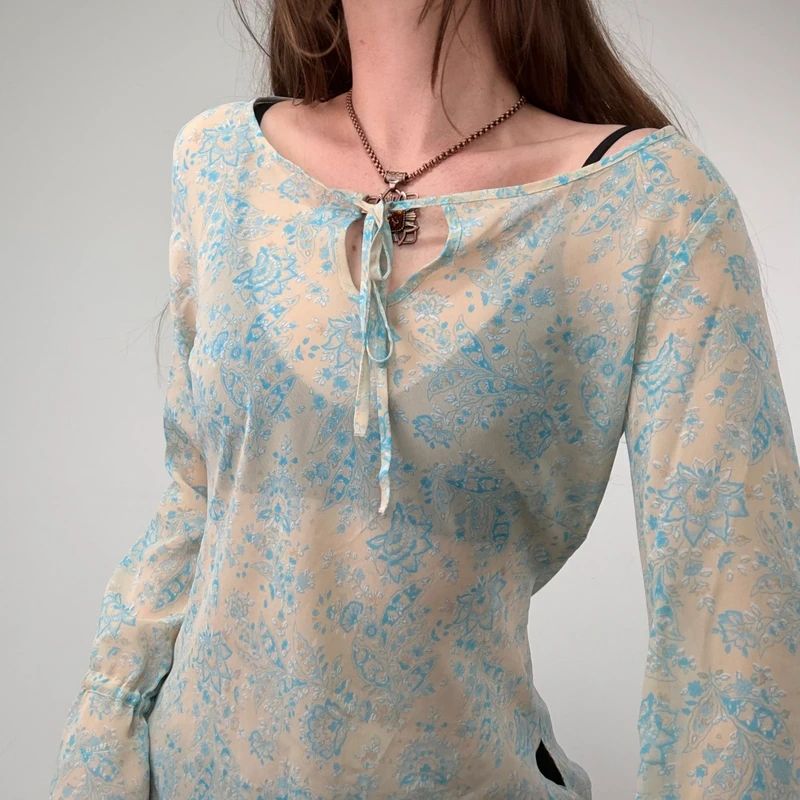 sheer floral flutter ETAM blouse with flare cuffs