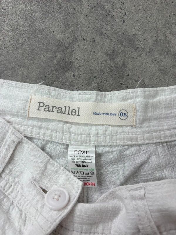 white linen wide leg low rise trousers